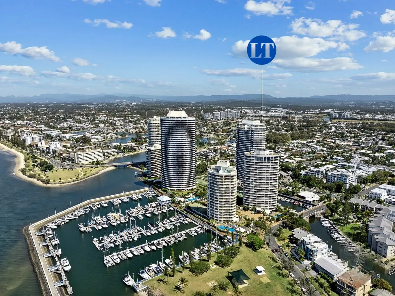 Aerial view of Runaway Bay Marina and the Broadwater with Leeward Tower marked